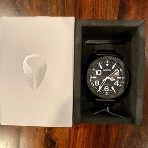 Nixon watch. Black titanium 51-30. Large face, bald and sporty. Great condition.